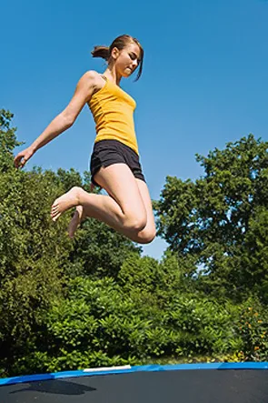 Young girl on a trampoline